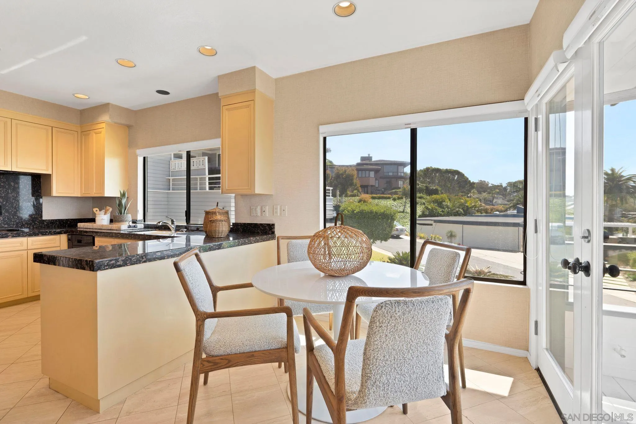 560 Torrey Point Road Del Mar, CA 92014 - Photo 10 of 35 a view of a dining room with furniture window and outside view