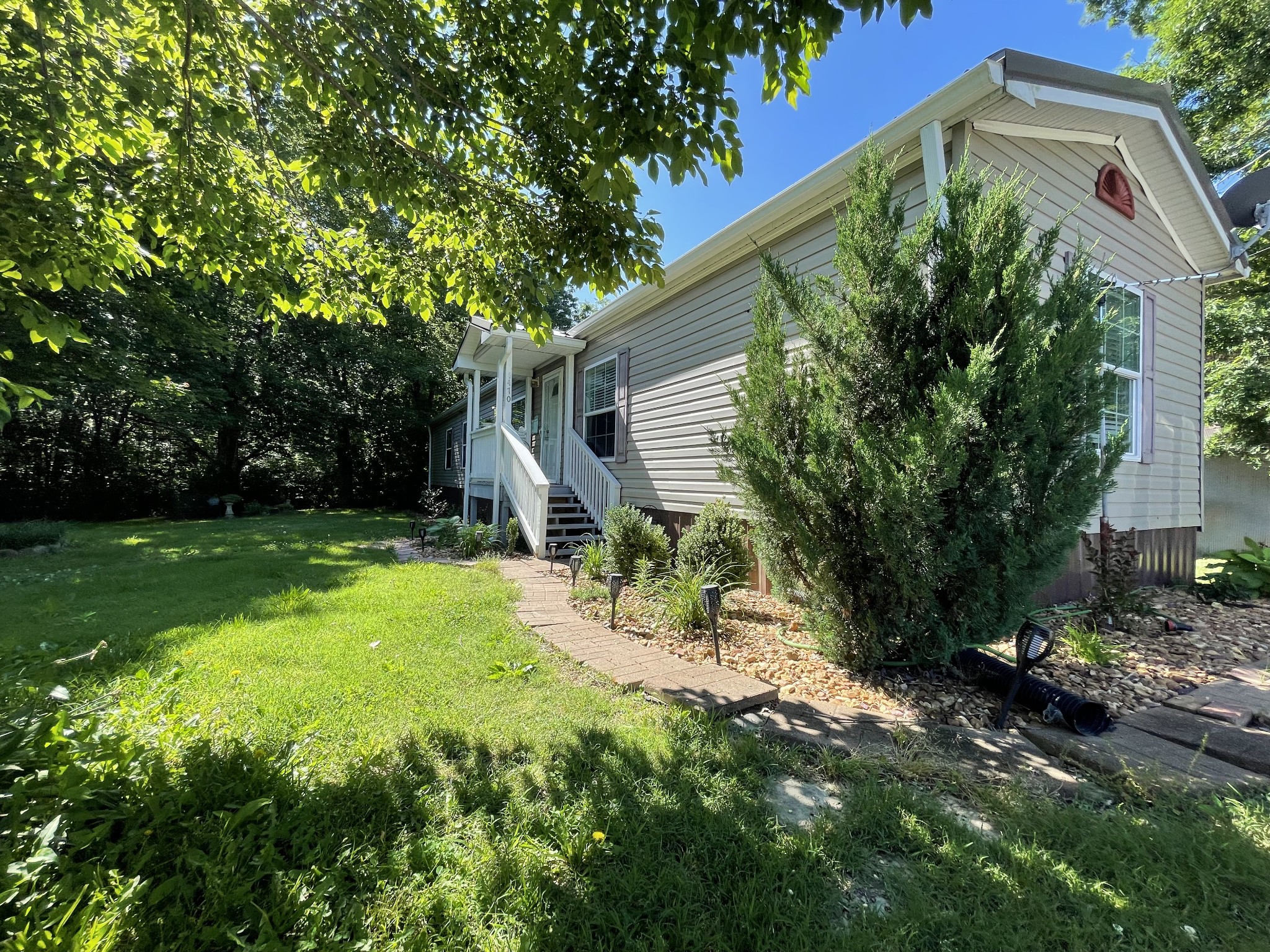 4470 St Paul Road Woodlawn, TN 37191 - Photo 3 of 9 a view of backyard of house with green space