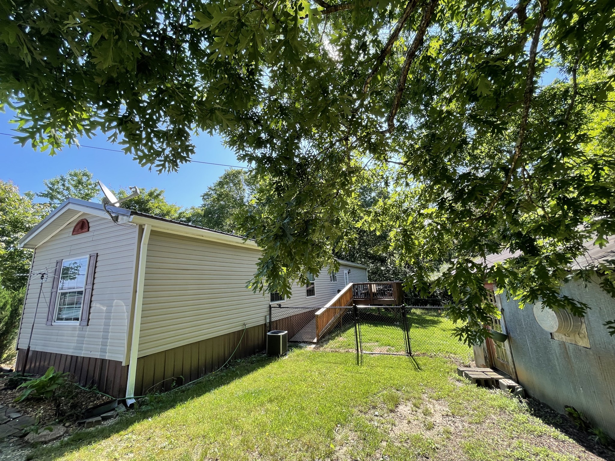 4470 St Paul Road Woodlawn, TN 37191 - Photo 5 of 9 a backyard of a house with lots of green space
