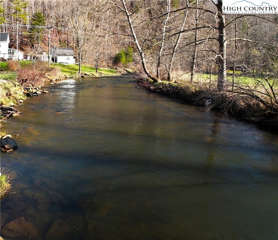 11644 Highway 88 Creston, NC 28615 - Photo 13 of 50 a view of a street with a yard