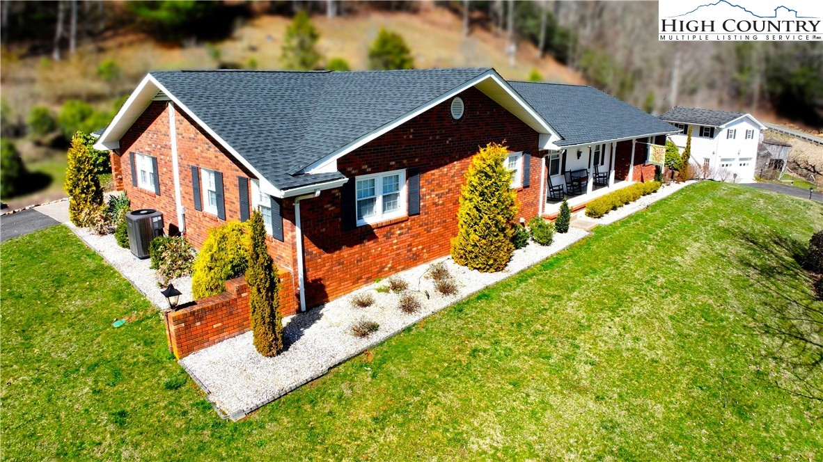 11644 Highway 88 Creston, NC 28615 - Photo 2 of 50 an aerial view of residential houses with yard