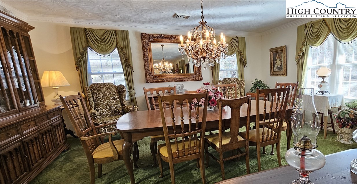 11644 Highway 88 Creston, NC 28615 - Photo 31 of 50 a view of a dining room with furniture window and outside view