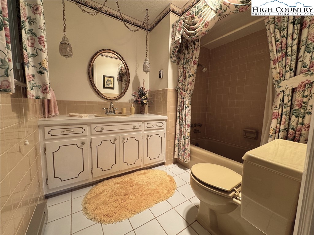 11644 Highway 88 Creston, NC 28615 - Photo 39 of 50 a bathroom with a toilet a sink and a shower