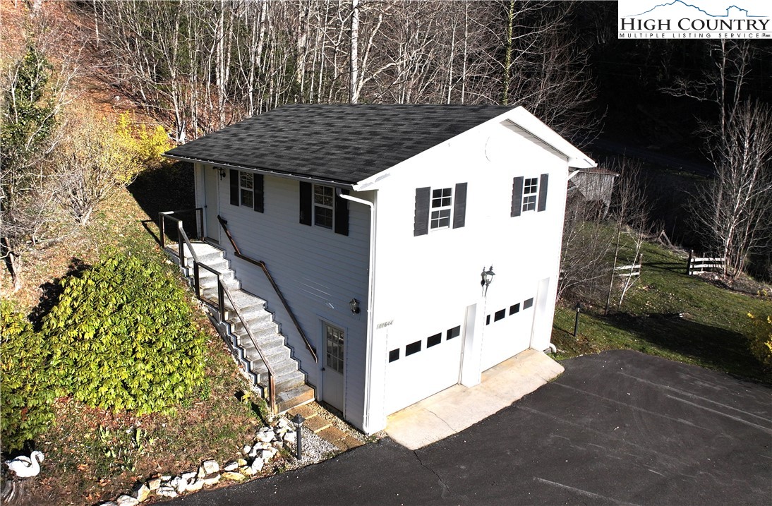 11644 Highway 88 Creston, NC 28615 - Photo 40 of 50 a view of house with backyard