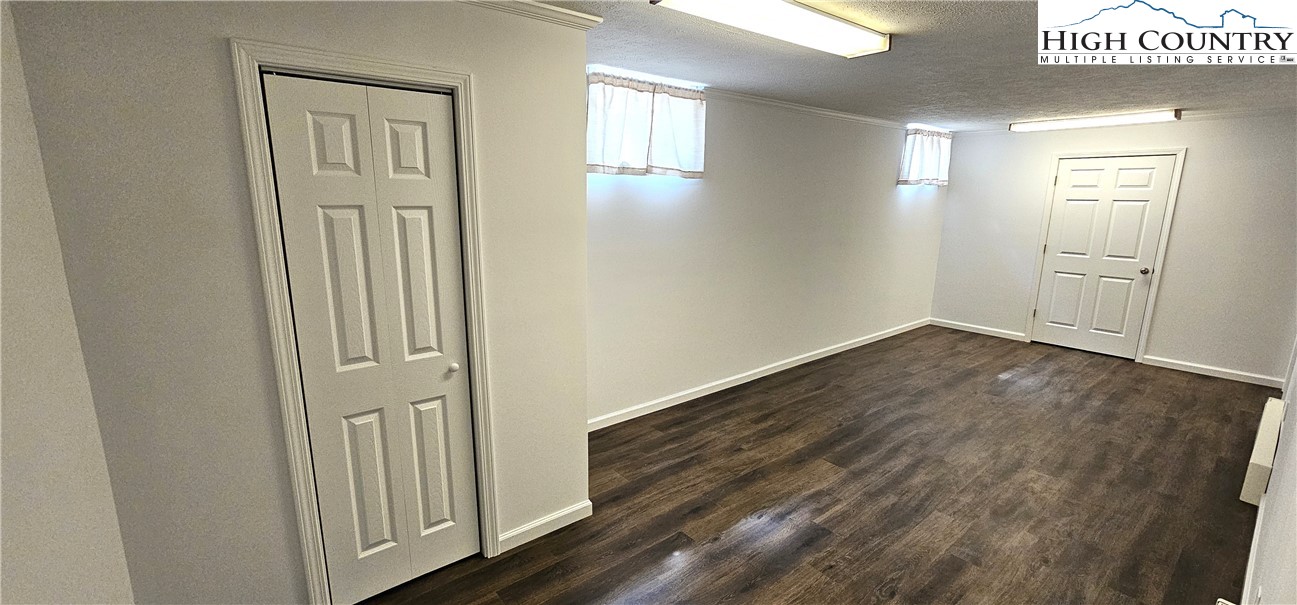 11644 Highway 88 Creston, NC 28615 - Photo 48 of 50 a view of a hallway with wooden floor