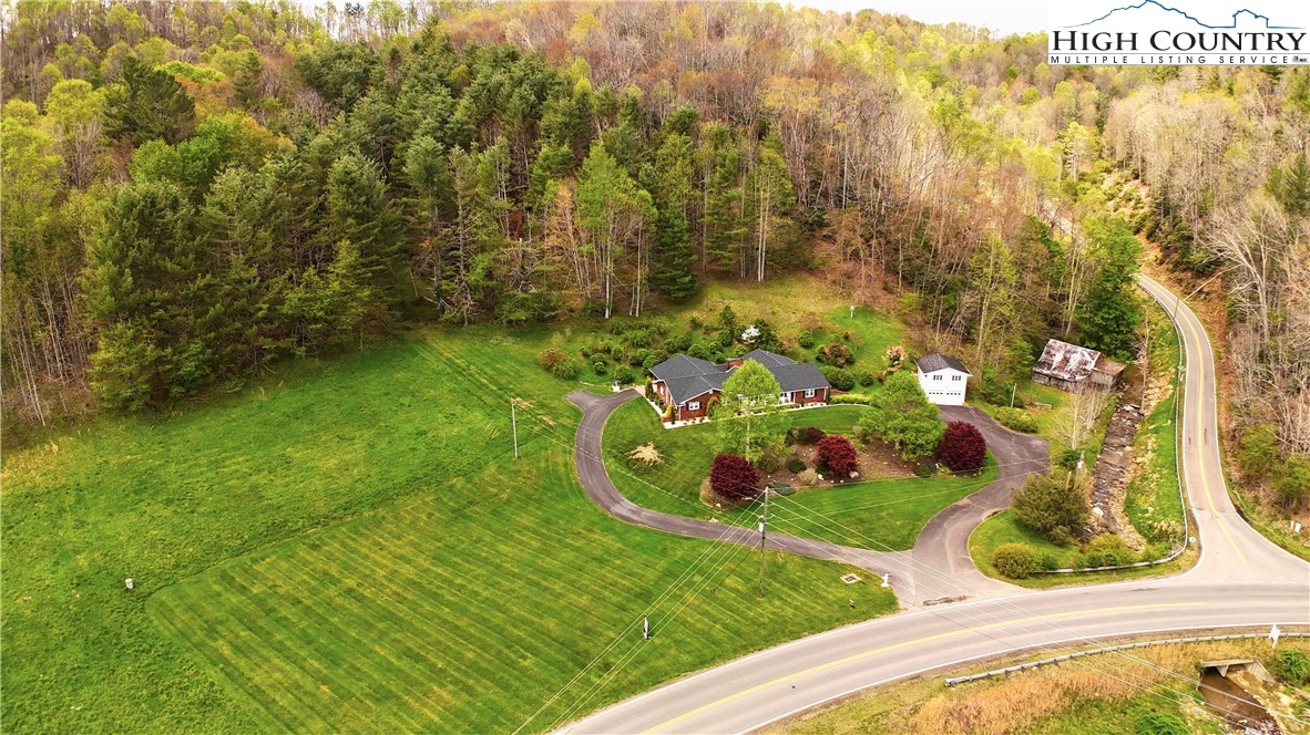 11644 Highway 88 Creston, NC 28615 - Photo 50 of 50 a view of a garden from a balcony