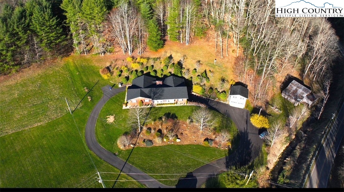 11644 Highway 88 Creston, NC 28615 - Photo 5 of 50 a view of a wooden floor