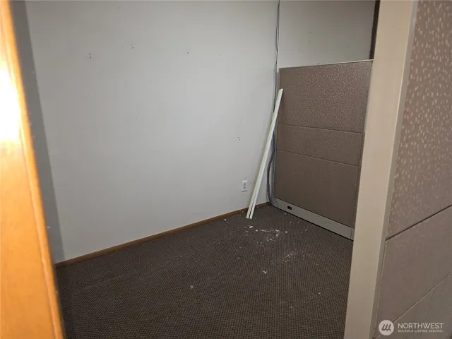 an empty room with a door