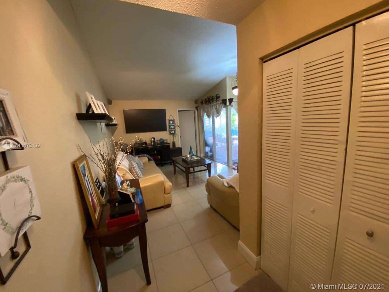 12374 Southwest 197th Terrace Miami, FL 33177 - Photo 6 of 13 a living room with furniture