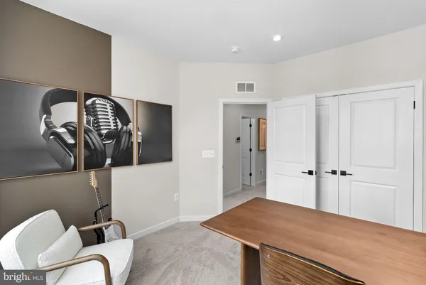 a view of a livingroom with furniture