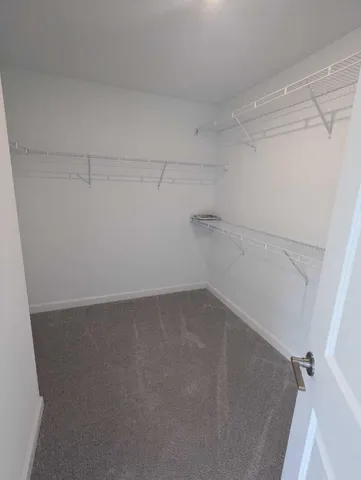 a view of a room with racks on the wall