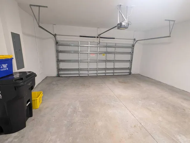 a kitchen with a refrigerator sink and microwave