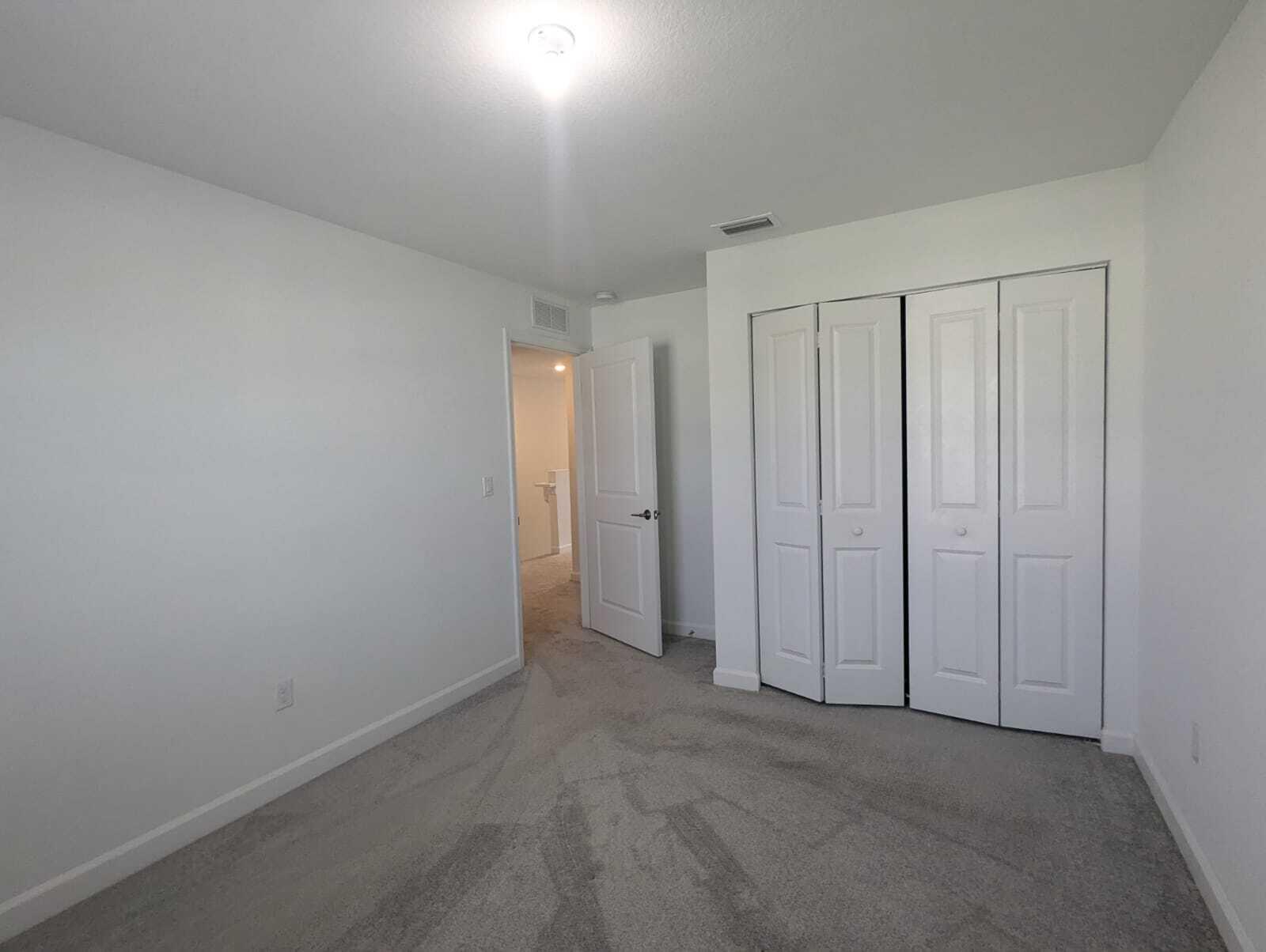 4351 Pond Lily Lane Lake Worth, FL 33467 - Photo 24 of 26 a view of an empty room