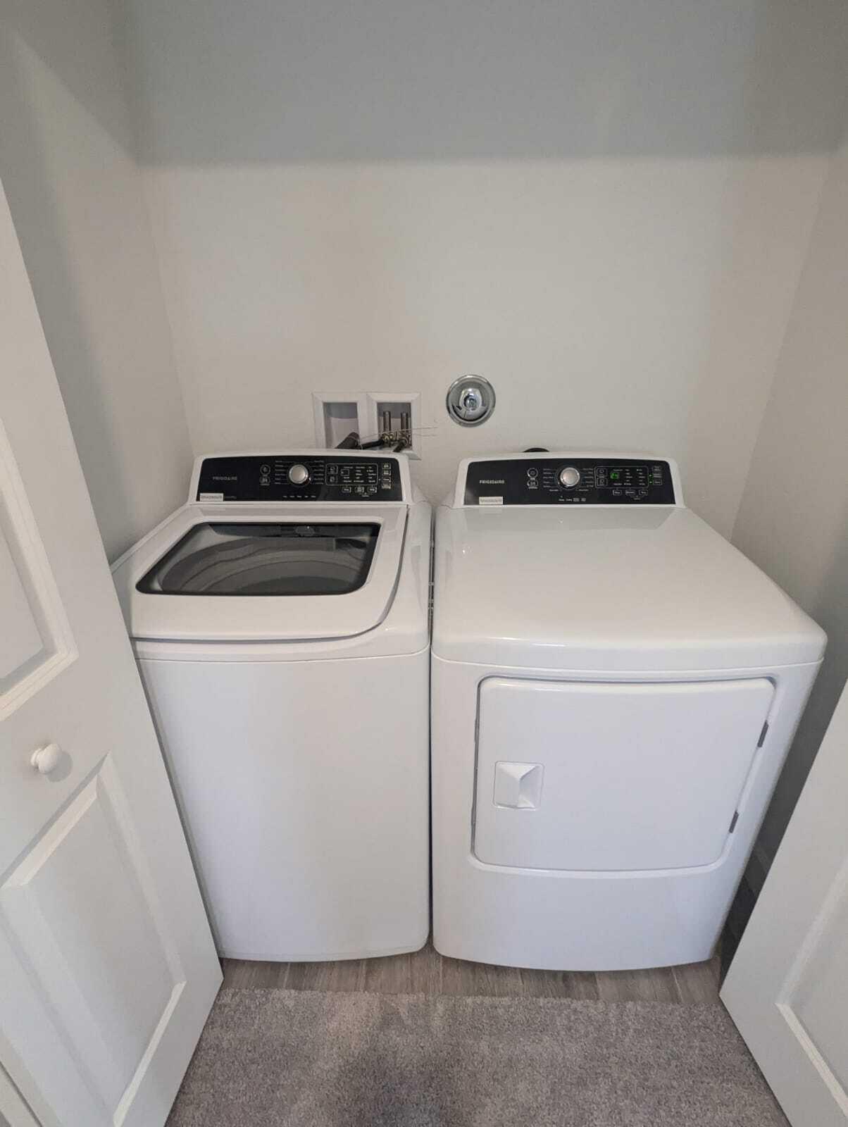 4351 Pond Lily Lane Lake Worth, FL 33467 - Photo 25 of 26 a utility room with dryer and washer