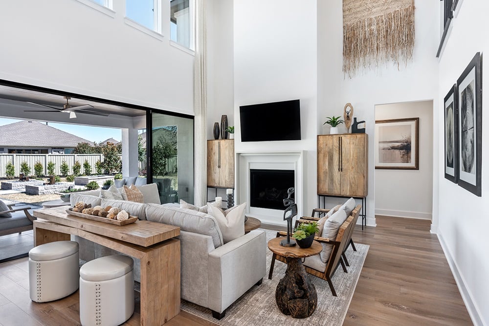 1804 Plum Tree Way Georgetown, TX 78628 - Photo 12 of 30 a living room with furniture a fireplace and a flat screen tv