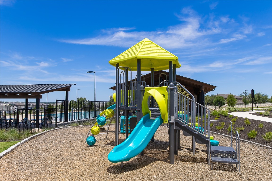 1804 Plum Tree Way Georgetown, TX 78628 - Photo 24 of 30 a view of a park with a slide
