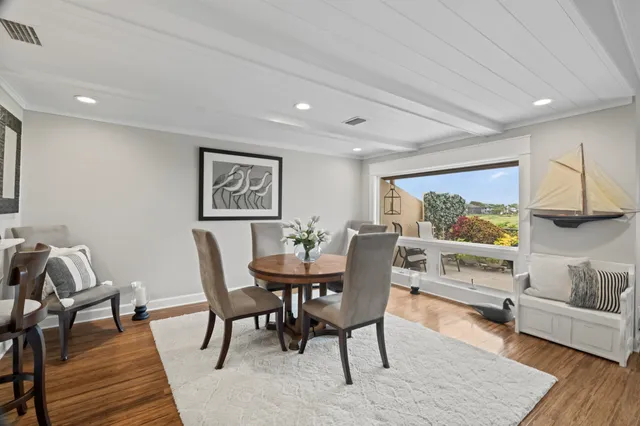 a view of a kitchen and dining room