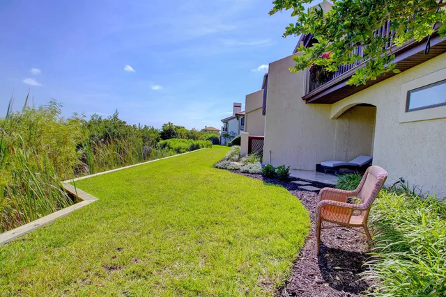 a view of swimming pool with chairs