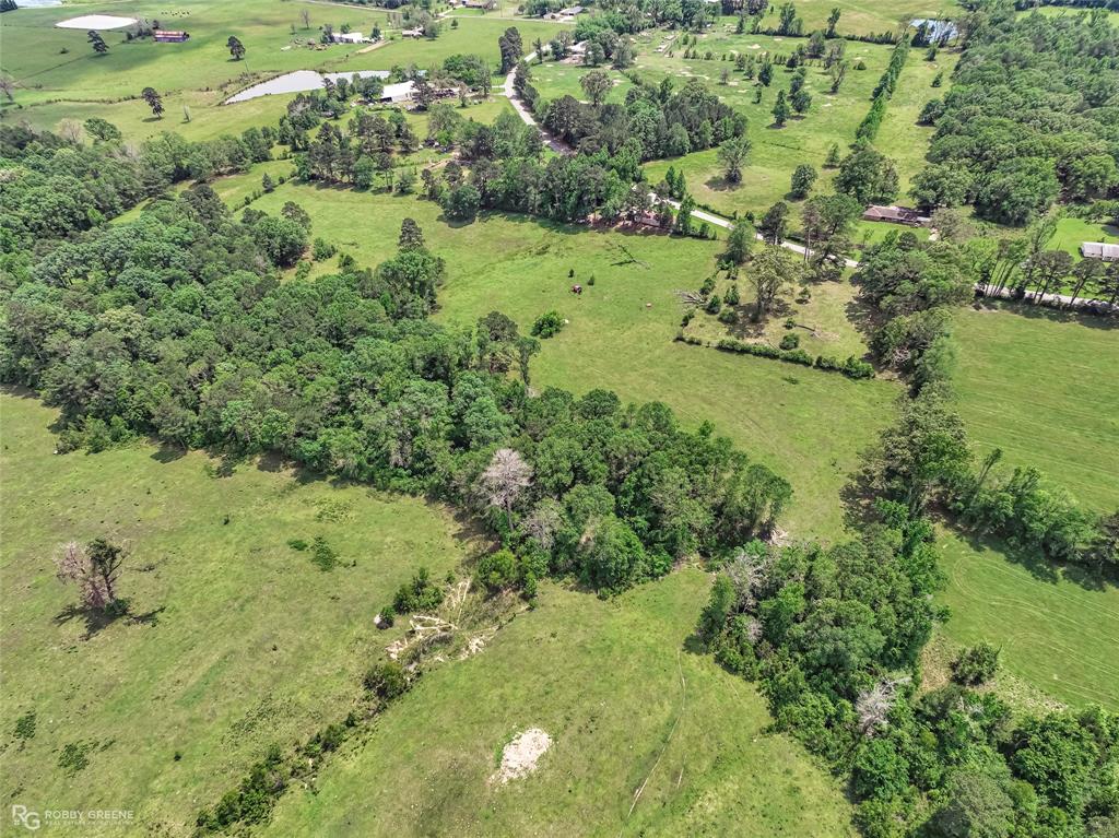 0 Jd Clayton Road Springhill, LA 71075 - Photo 3 of 5 a view of a lake with a yard