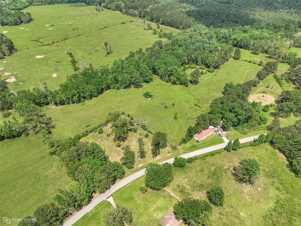 0 Jd Clayton Road Springhill, LA 71075 - Photo 5 of 5 a view of a lake with a yard