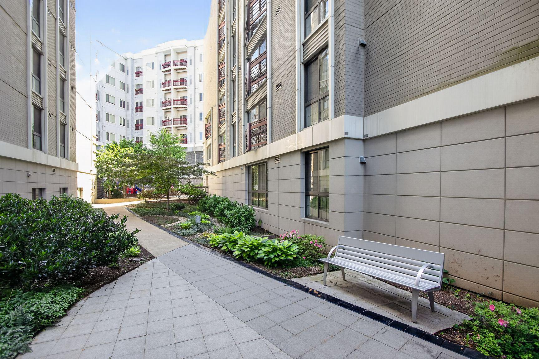 7915 Eastern Avenue Northwest, Unit 1011 Silver Spring, MD 20910 - Photo 21 of 28 a view of a building with garden