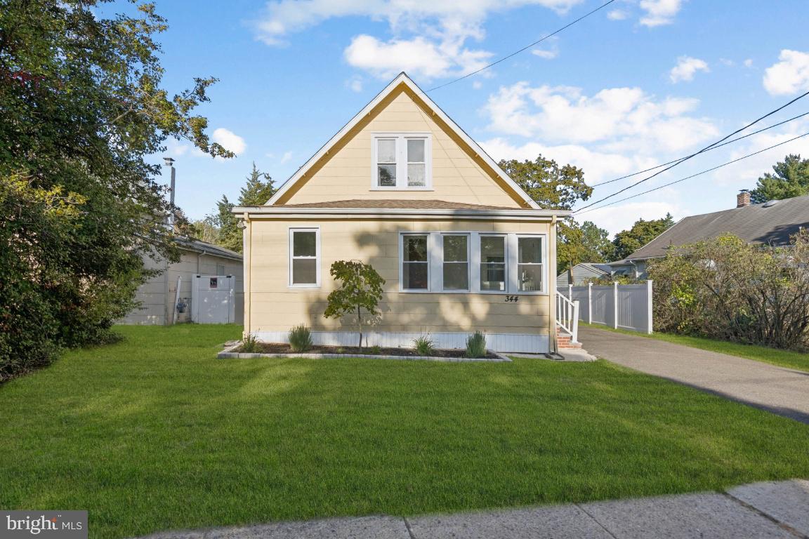 344 Raritan Avenue Atco, NJ 08004 - Photo 2 of 26 a front view of a house with a yard