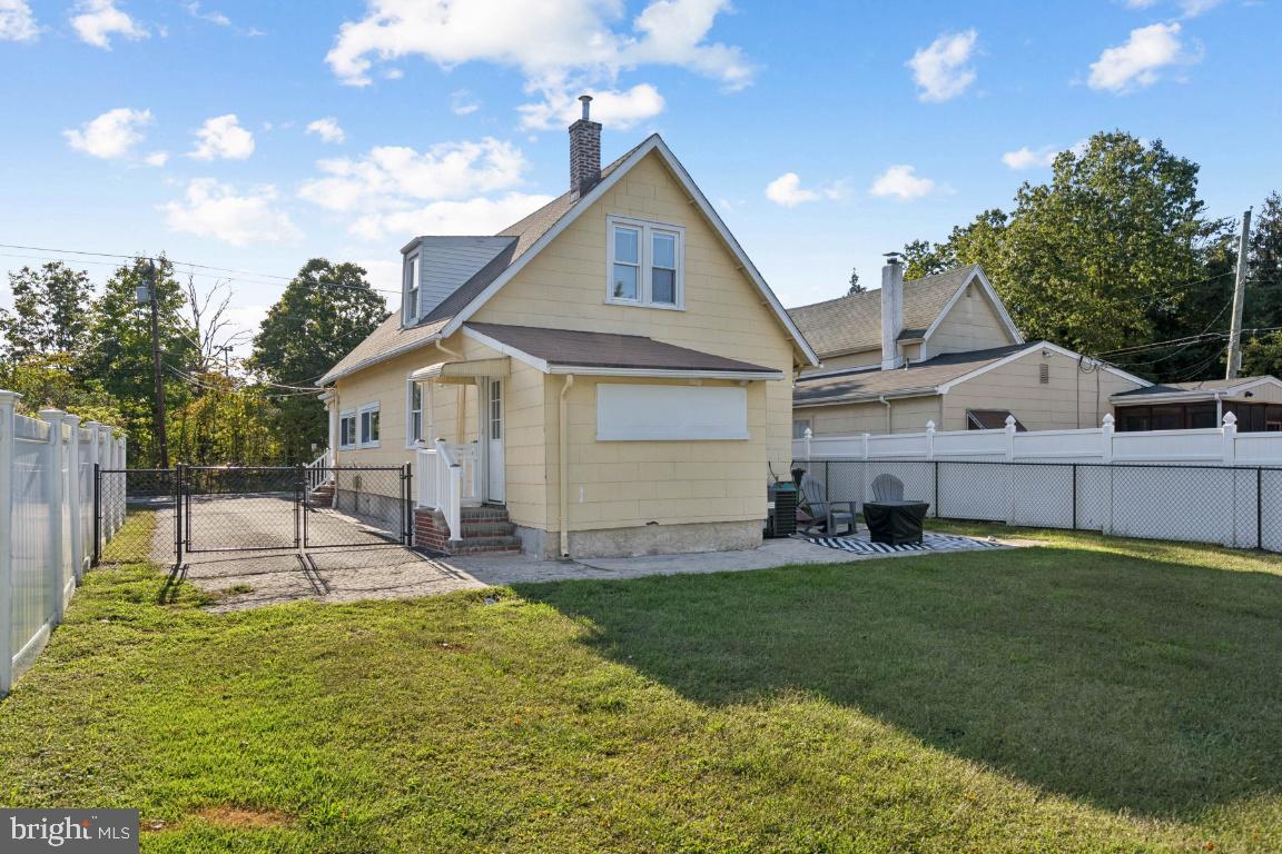 344 Raritan Avenue Atco, NJ 08004 - Photo 25 of 26 a view of a house with a yard and sitting area