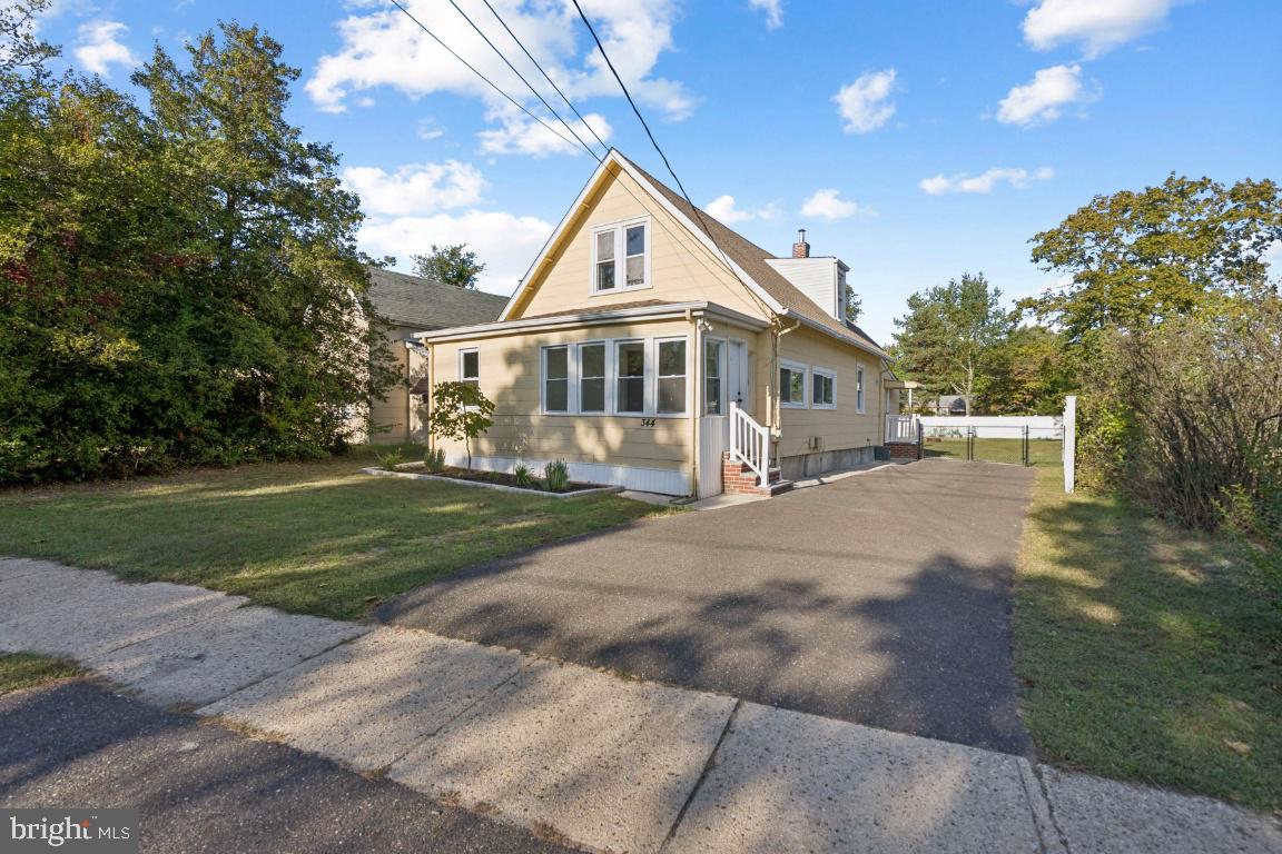 344 Raritan Avenue Atco, NJ 08004 - Photo 3 of 26 a front view of a house with a yard
