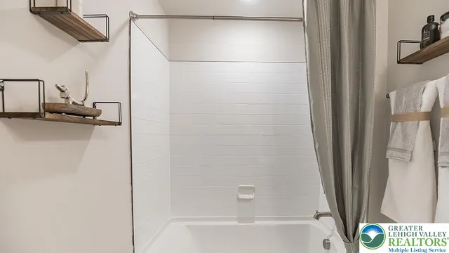 a bathroom with a bathtub