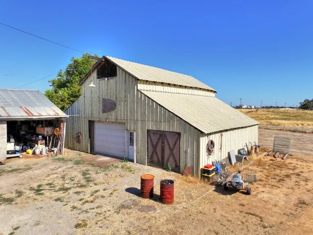 a front view of a house with a patio