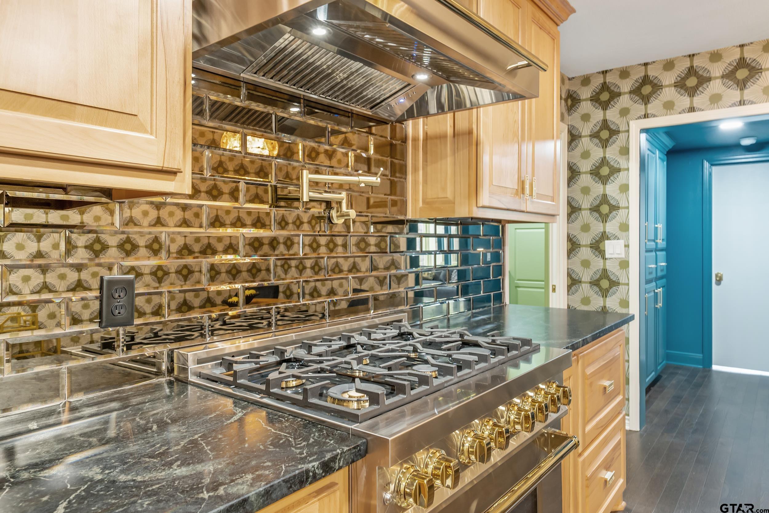 606 Tremont Place Tyler, TX 75701 - Photo 11 of 48 a view of a living room with wooden floor and a sink