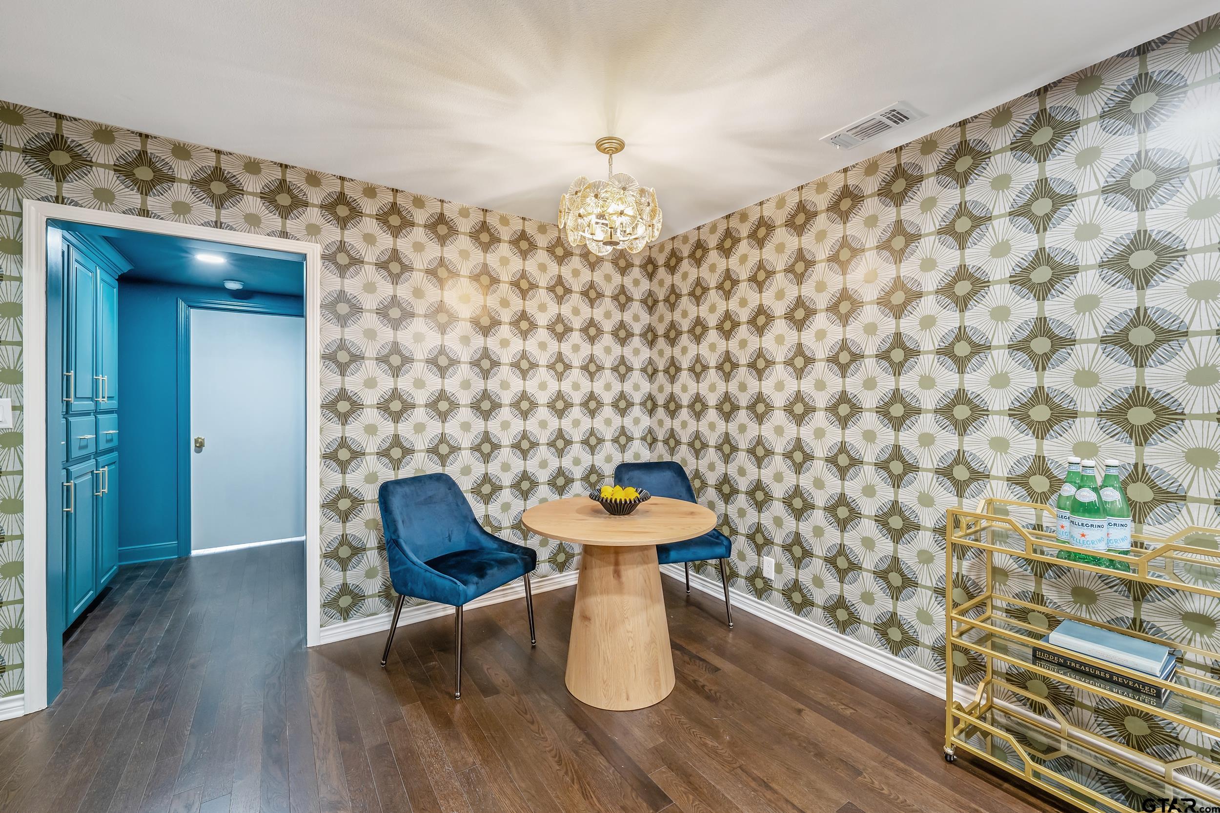 606 Tremont Place Tyler, TX 75701 - Photo 13 of 48 a dining room with furniture and wooden floor