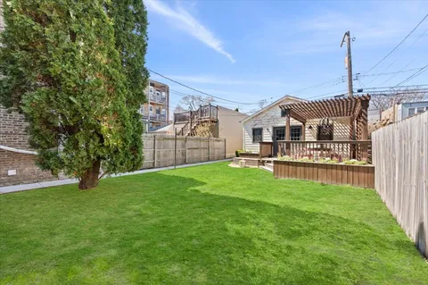 a house view with a garden space