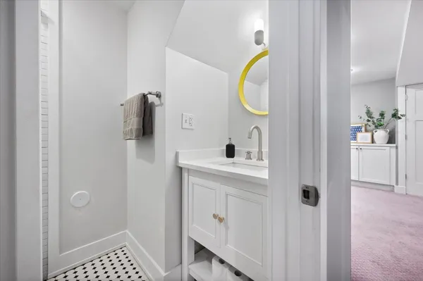 a picture of a wall with a white wall and a picture