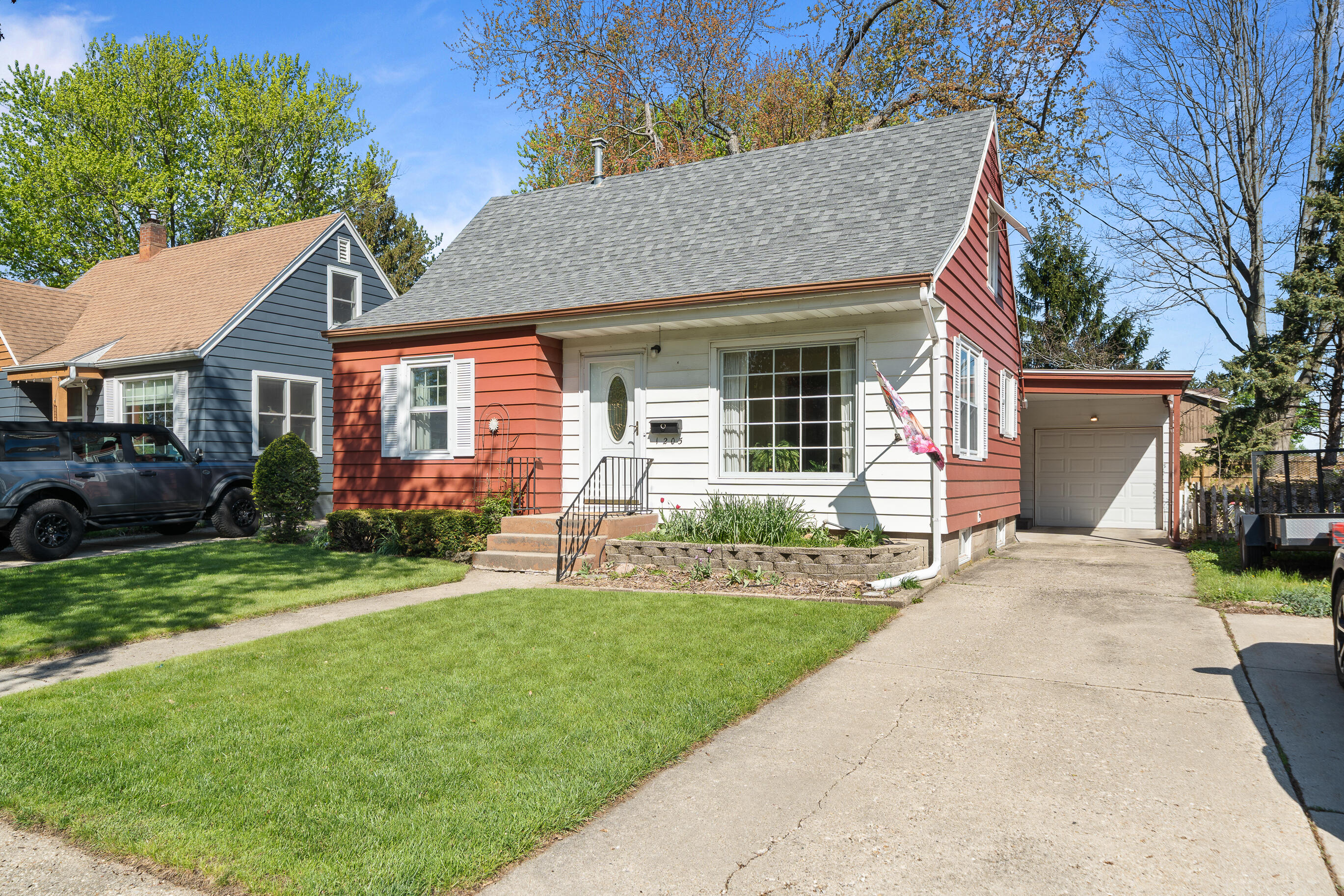 1205 Barnes Street Delavan, WI 53115 - Photo 2 of 29 B. Attached Garage