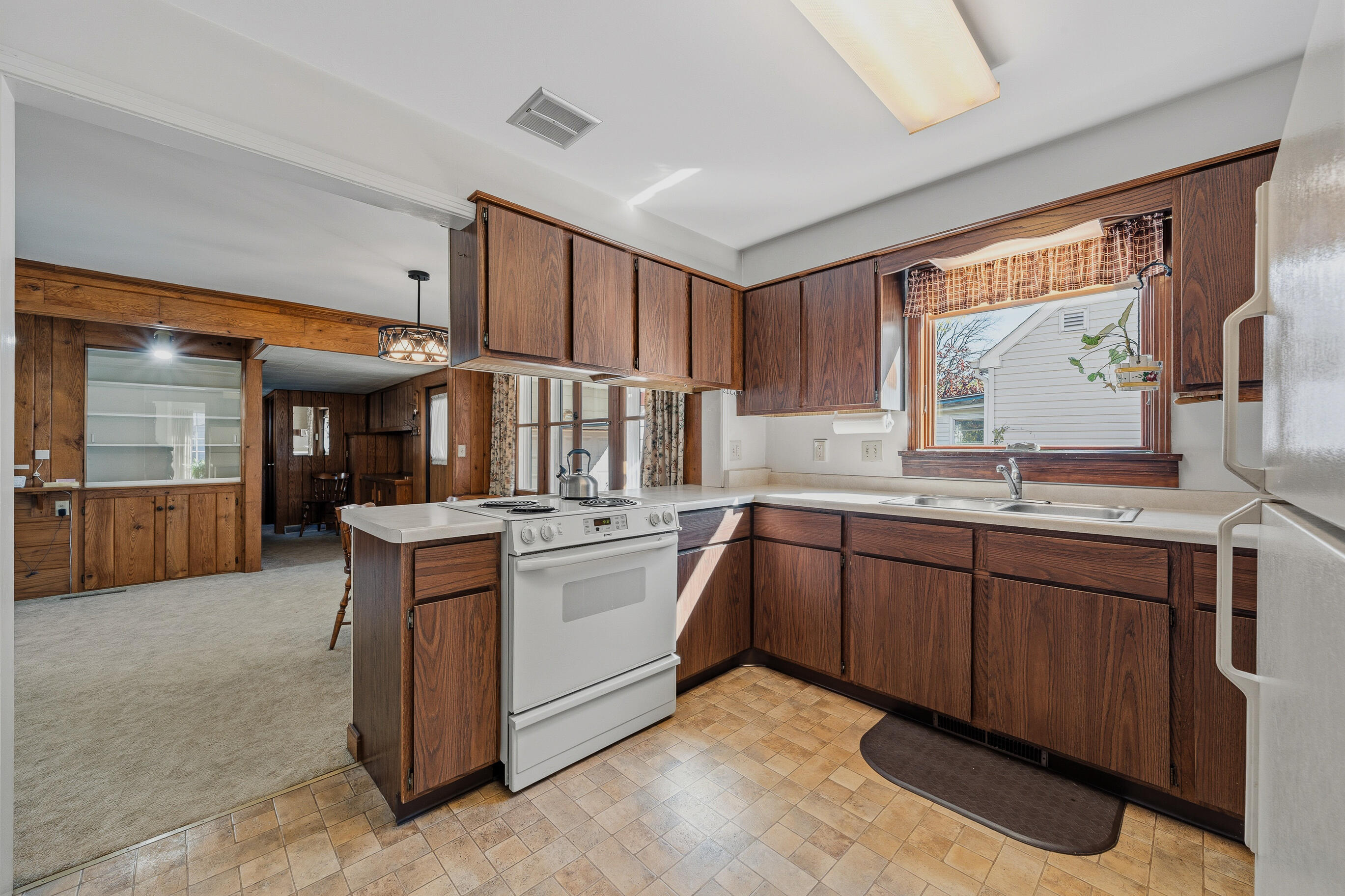 1205 Barnes Street Delavan, WI 53115 - Photo 7 of 29 G. Kitchen to Dining Room