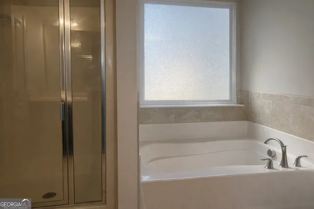 a bathroom with a bathtub