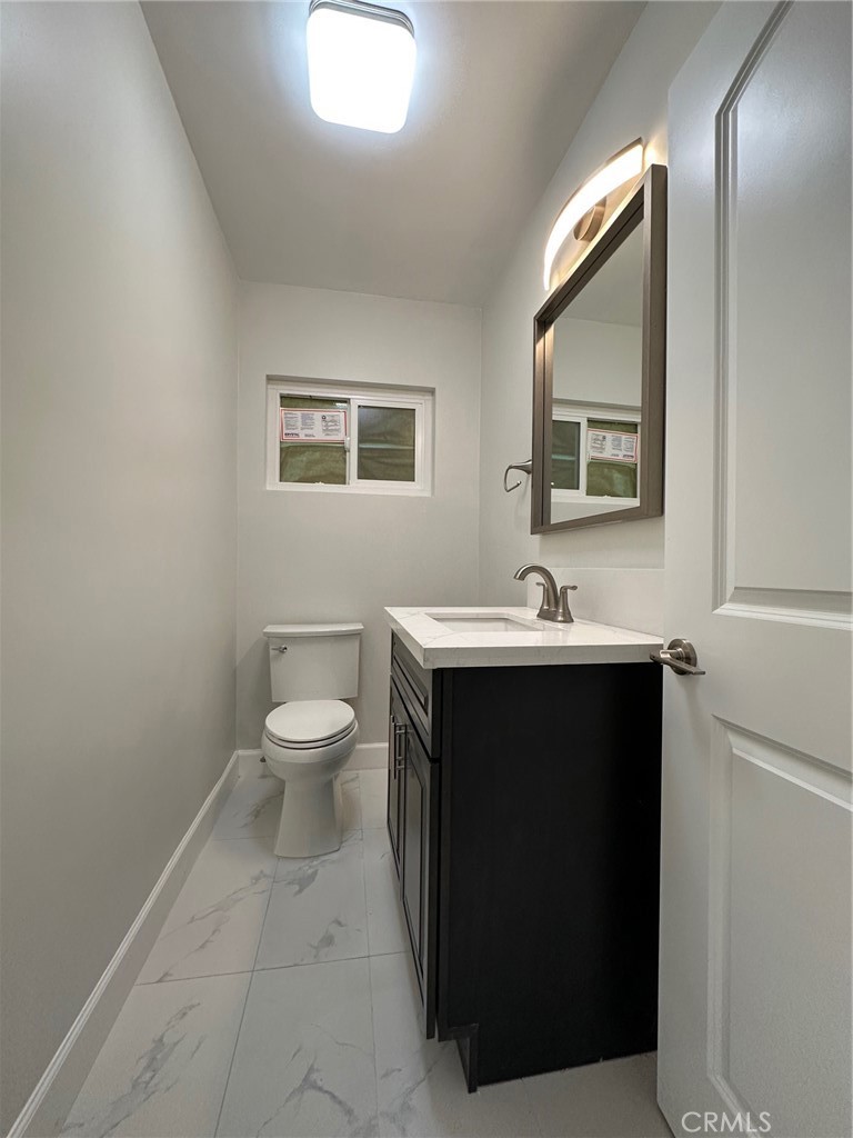 260 Linda Rosa Avenue, Unit 6 Pasadena, CA 91107 - Photo 6 of 12 a bathroom with a sink and a mirror