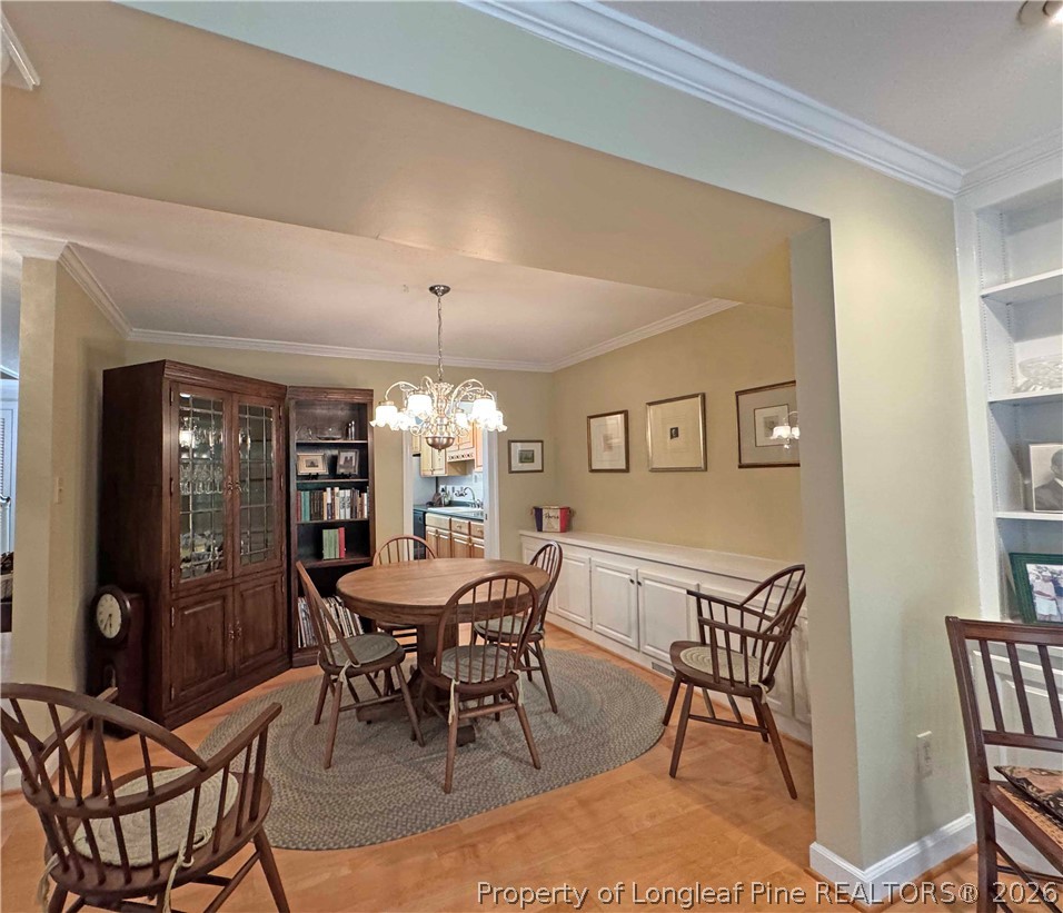 190 Palmetto Road Pinehurst, NC 28374 - Photo 11 of 19 a view of a dining room with furniture and window