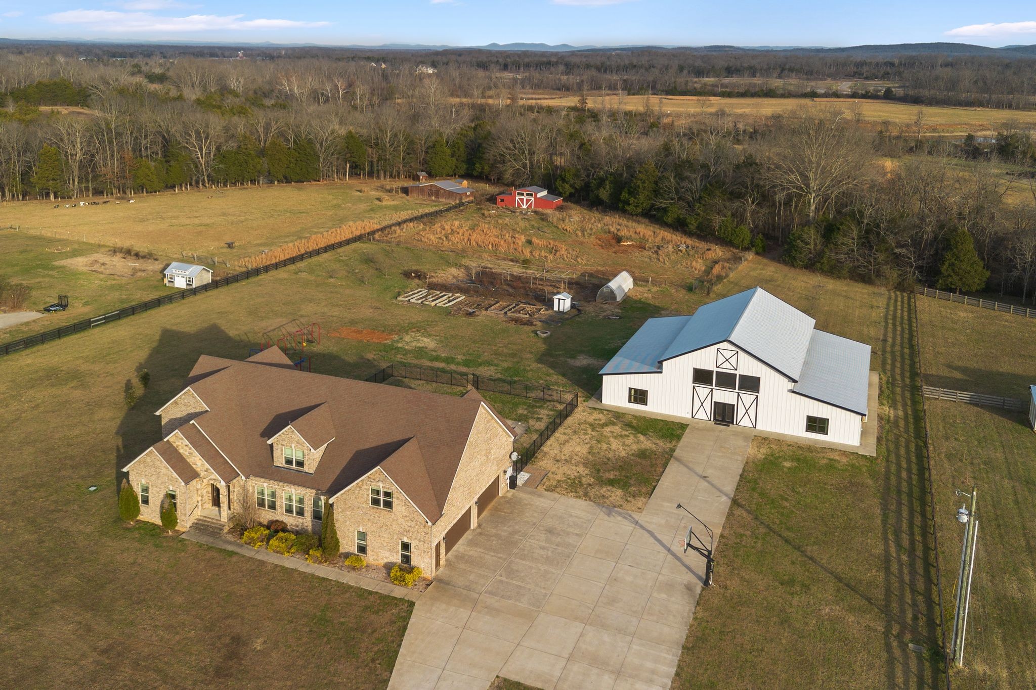 7607 Midland Road Christiana, TN 37037 - Photo 2 of 48 a view of a lake with a mountain in the background