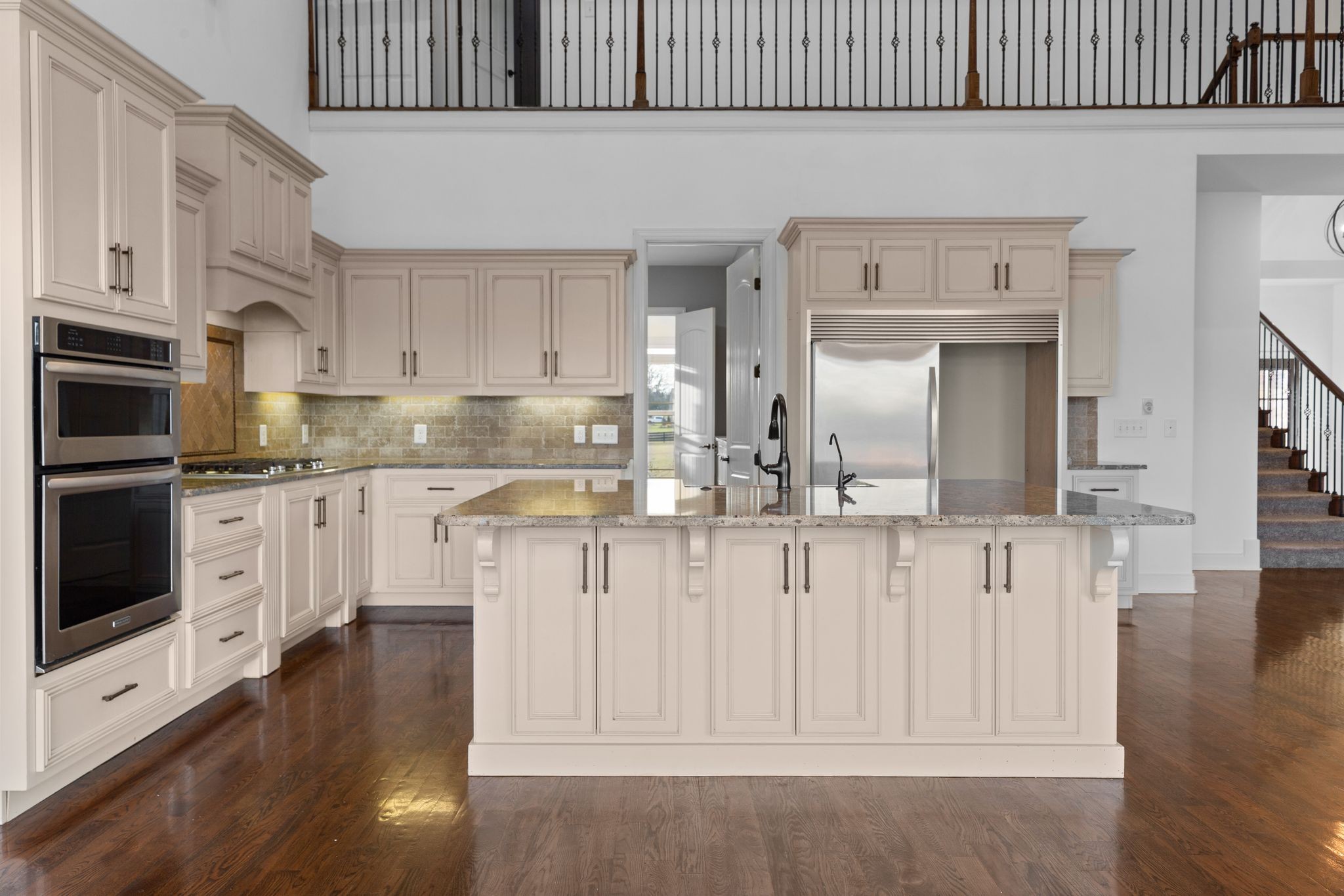 7607 Midland Road Christiana, TN 37037 - Photo 24 of 48 a kitchen with stainless steel appliances granite countertop a sink a stove and cabinets