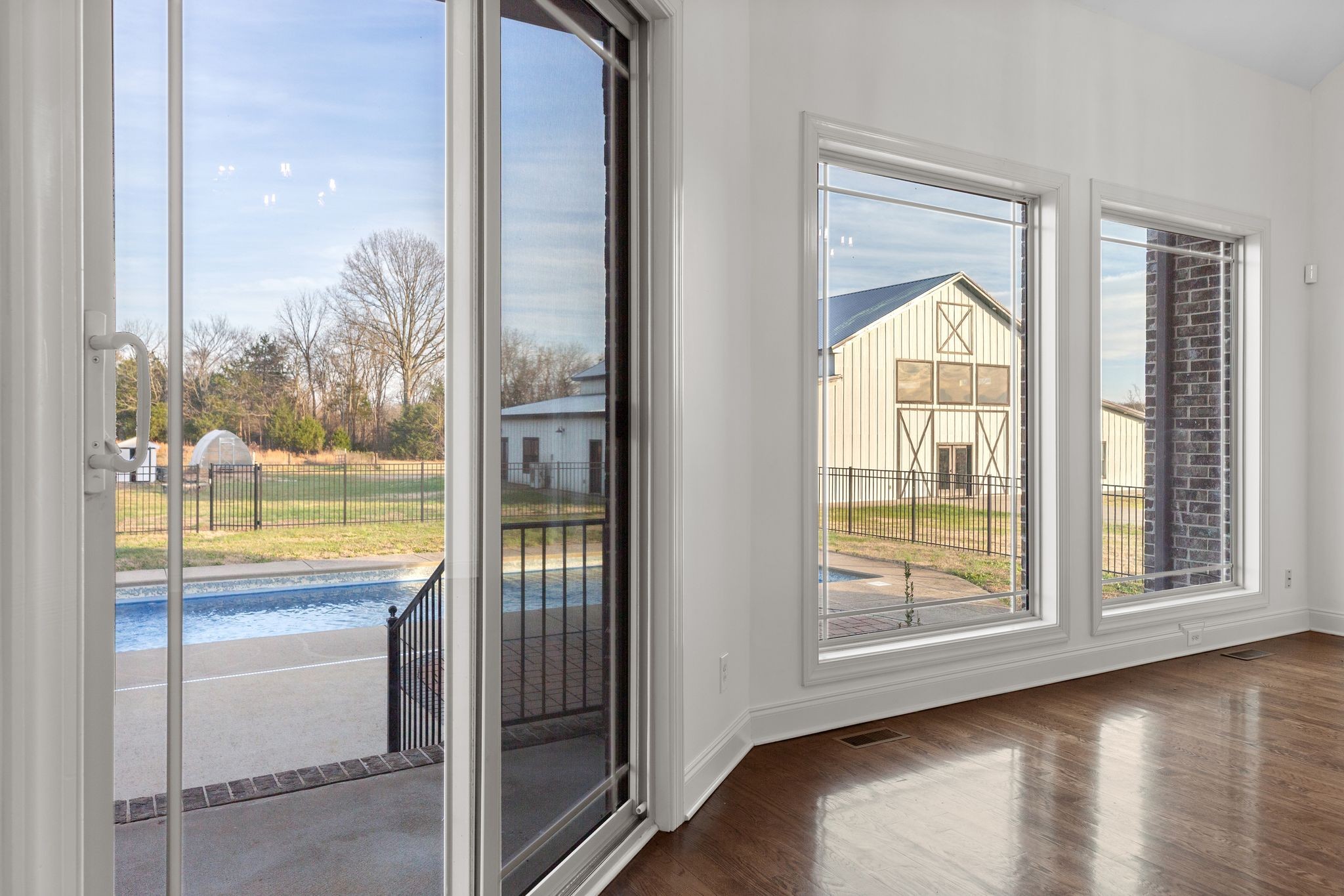 7607 Midland Road Christiana, TN 37037 - Photo 25 of 48 a view of a room with window wooden floor and front door