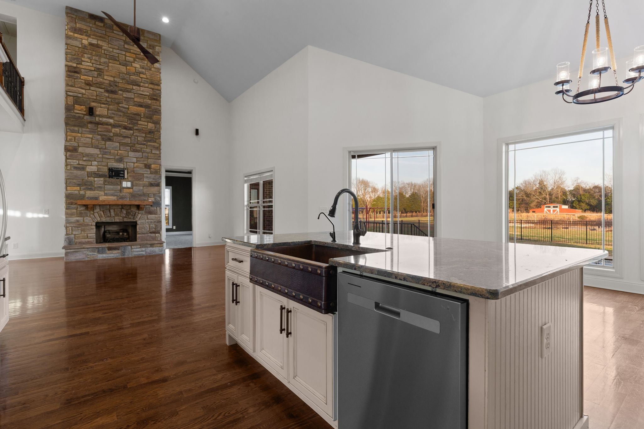7607 Midland Road Christiana, TN 37037 - Photo 27 of 48 a kitchen with stainless steel appliances granite countertop a stove and a refrigerator
