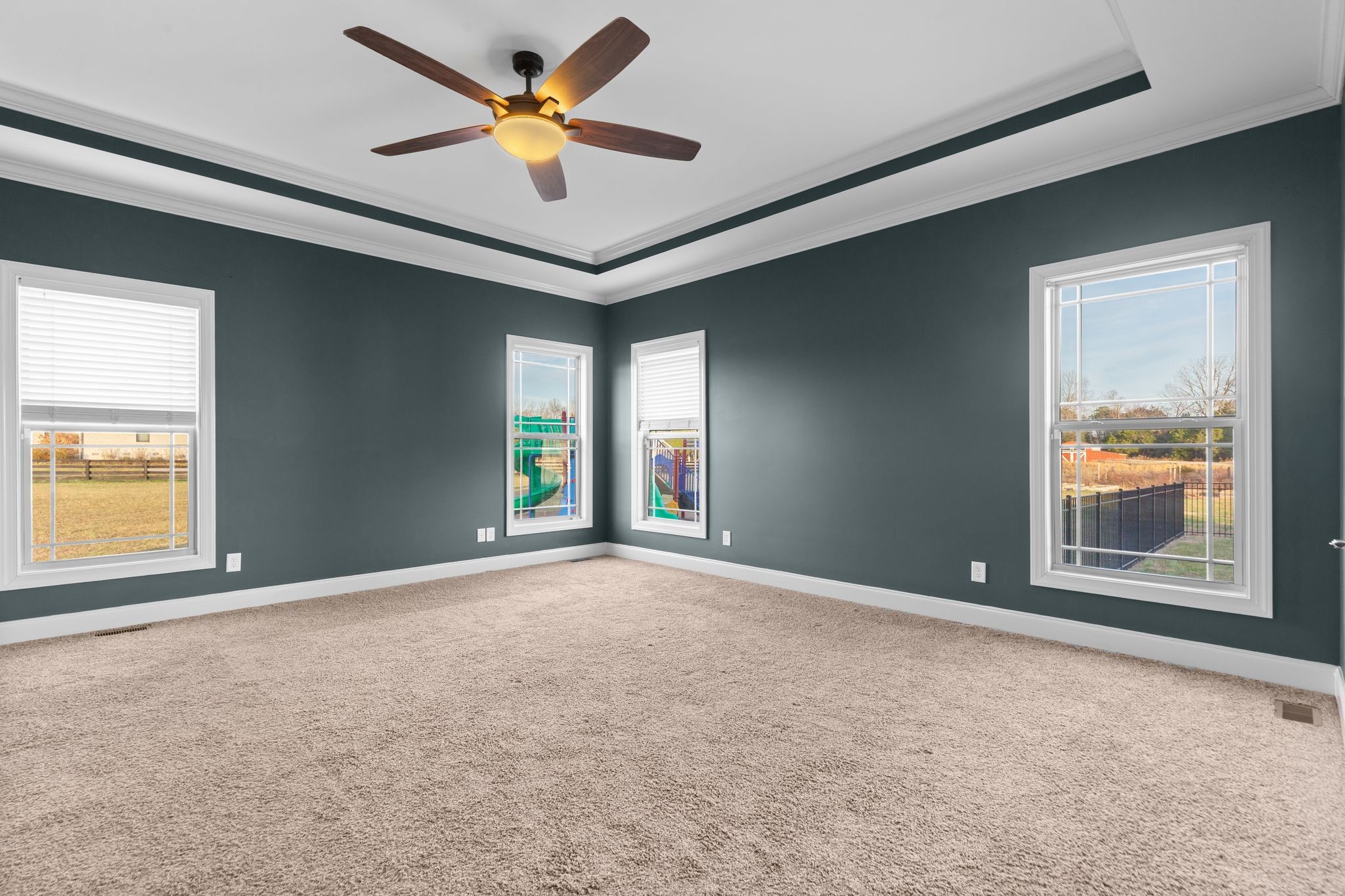 7607 Midland Road Christiana, TN 37037 - Photo 31 of 48 an empty room with windows and fan