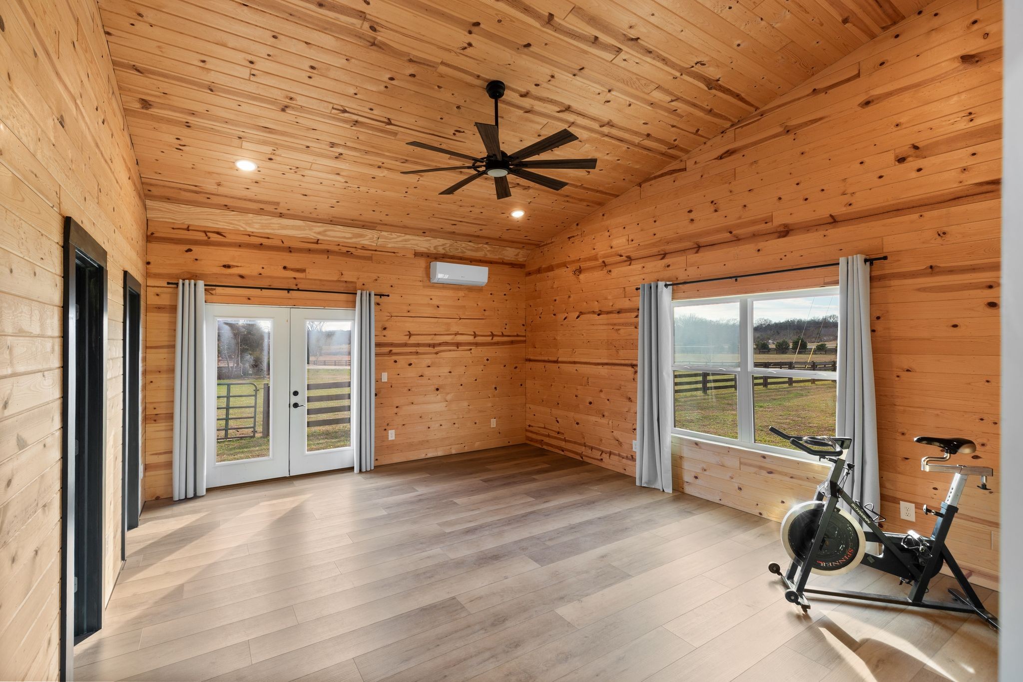 7607 Midland Road Christiana, TN 37037 - Photo 43 of 48 an empty room with wooden floor and windows