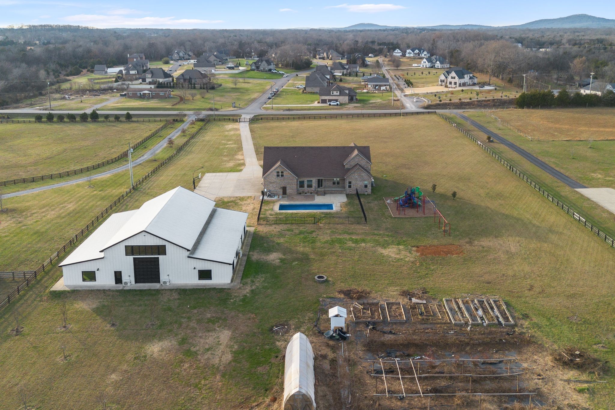 7607 Midland Road Christiana, TN 37037 - Photo 8 of 48 a view of a lake with a house in the background