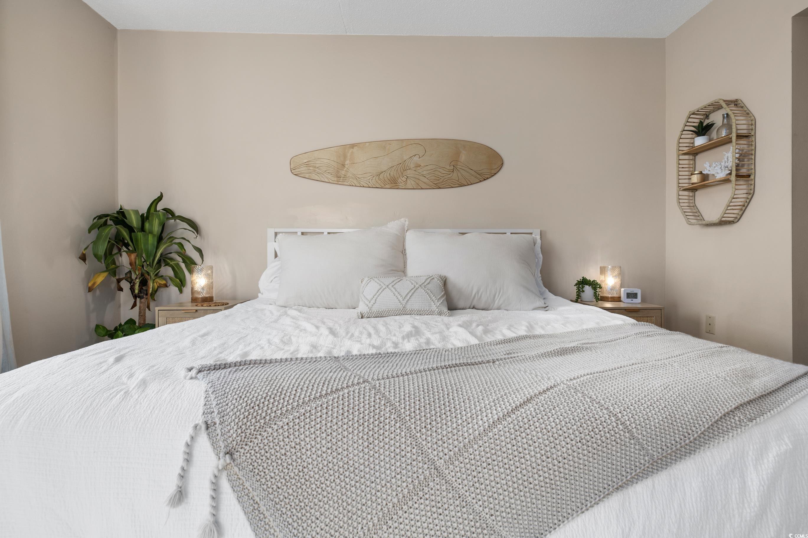 1108 North Waccamaw Drive, Unit 304 Murrells Inlet, SC 29576 - Photo 16 of 34 View of bedroom