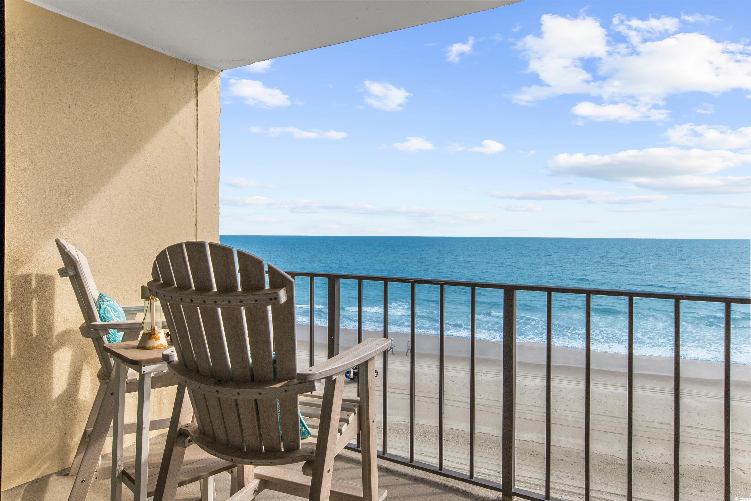 1108 North Waccamaw Drive, Unit 304 Murrells Inlet, SC 29576 - Photo 21 of 34 Balcony with view of water and beach