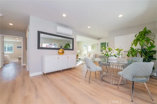 a view of a livingroom with furniture and a potted plant