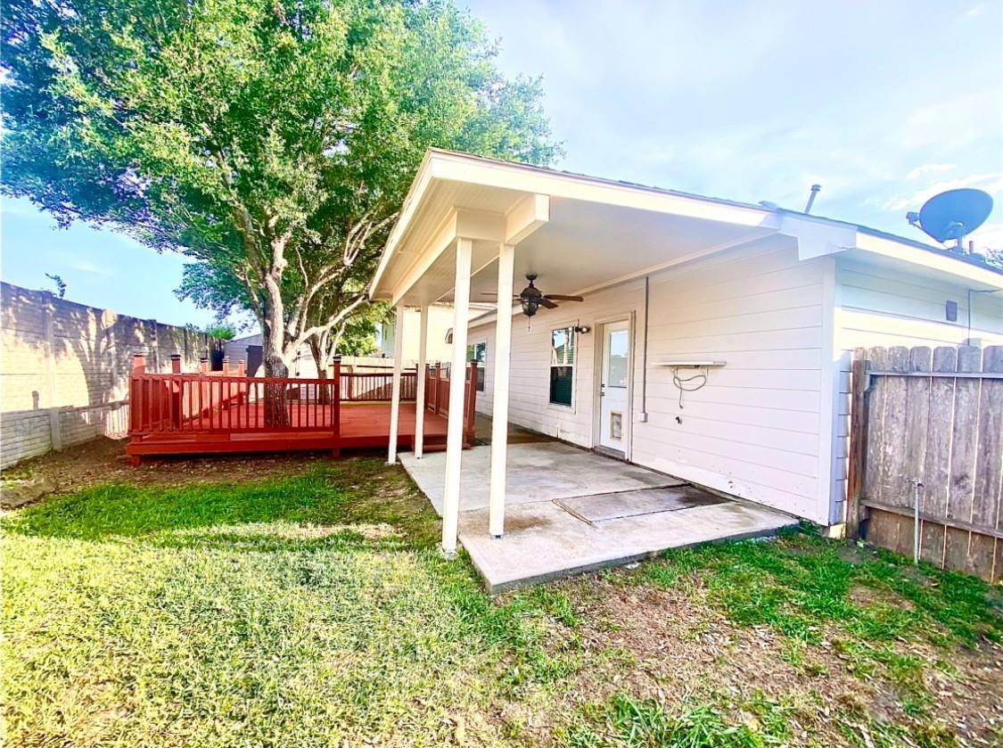 2813 Waterside Trail Pearland, TX 77584 - Photo 24 of 25 a view of a house with a yard
